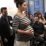 My Boss Humiliated Me at a Staff Meeting Because of My Pregnancy – His Smile Faded When a Woman Holding a Baby Walked In