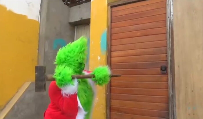 WATCH: South American Police Deploy Officer Disguised as the Grinch to Bust Drug Traffickers